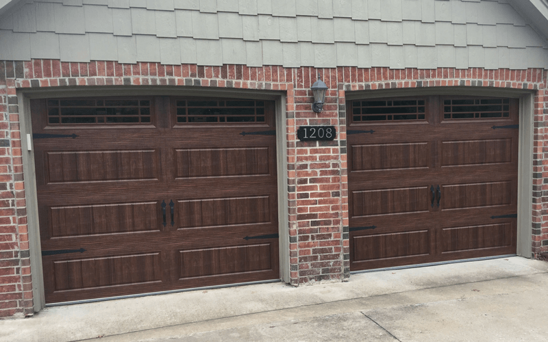 stained residential garage doors with windows