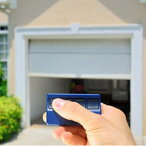 Garage Door Opener opening a residential garage door.