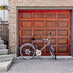 Wood Garage Door with a bicycle in front of it