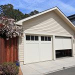 Open garage door in suburban house