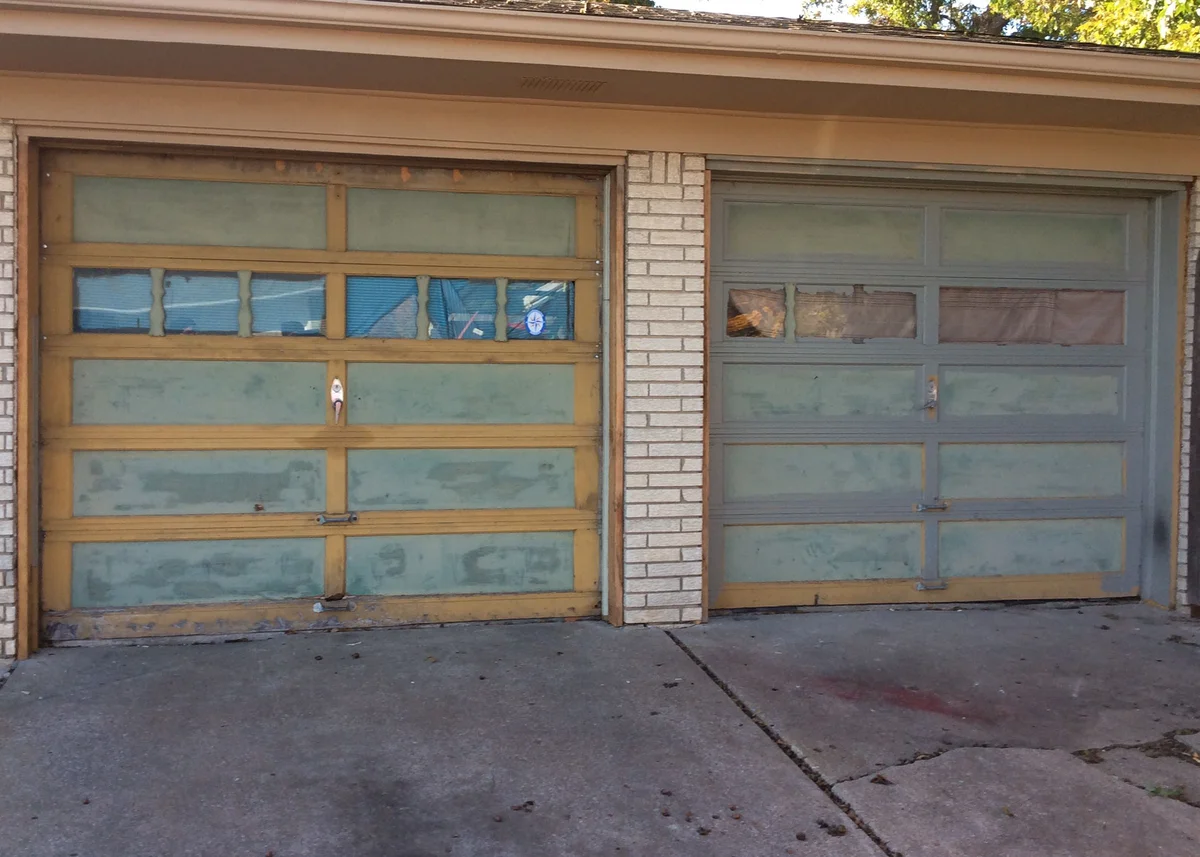 Before: deteriorating garage doors in need of replacement